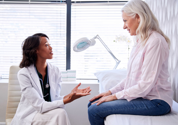 Aya Locums image of a doctor and patient